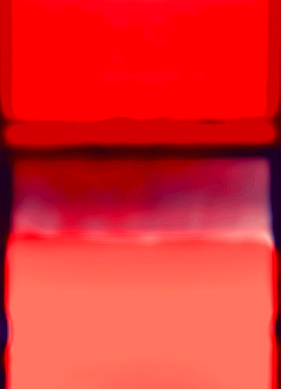 Abstract image featuring two horizontal blocks: a vibrant red block on top and a lighter, softer red block on the bottom, separated by a blurry, dark, purplish line. The edges are diffuse and blended.
