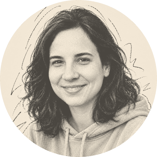 Smiling woman with shoulder-length wavy hair wearing a hoodie; sketched lines in the background add a playful effect. Image is in sepia tone within a circular frame.