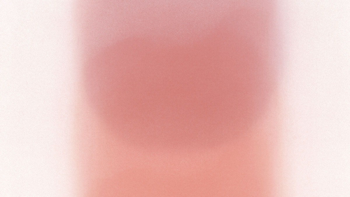 Soft, abstract image with a vertical gradient of pink and peach hues, featuring blurred, rounded shapes and smooth transitions between lighter and darker areas.